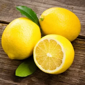 Lemons On Wooden Background
