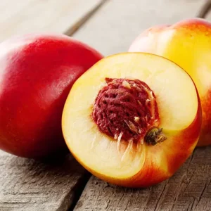 Nectarines On Wooden Background