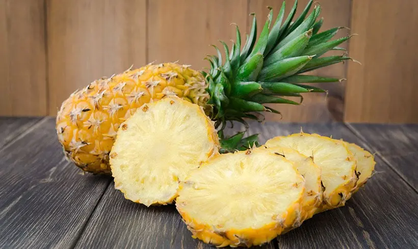 Pineapple On Wooden Table